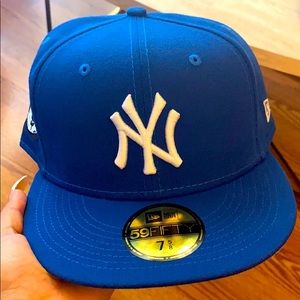 Blue yankee hat with money sign on the side brand